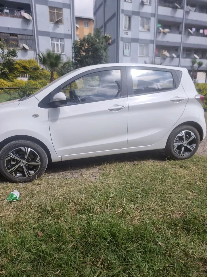2023 Model White Hatchback Car – photo 4